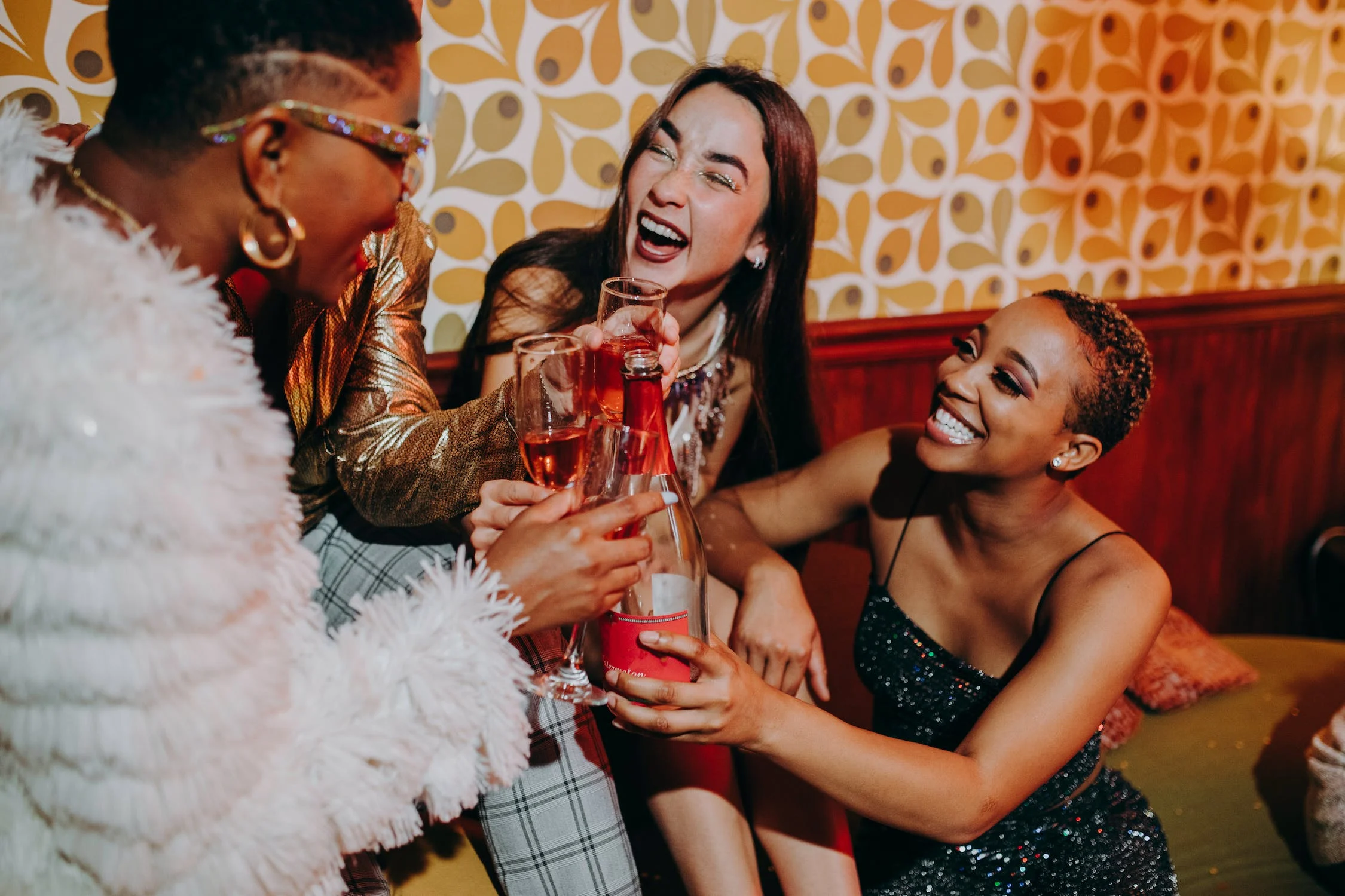 Happy women enjoying some wine
